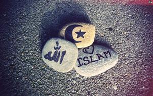 Muslim Symbols painted on flat stones